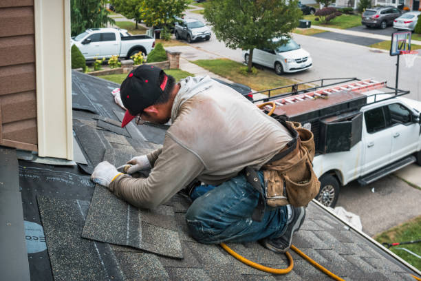 Professional Storm Damage Roof Repair technician working in Edmund, WI